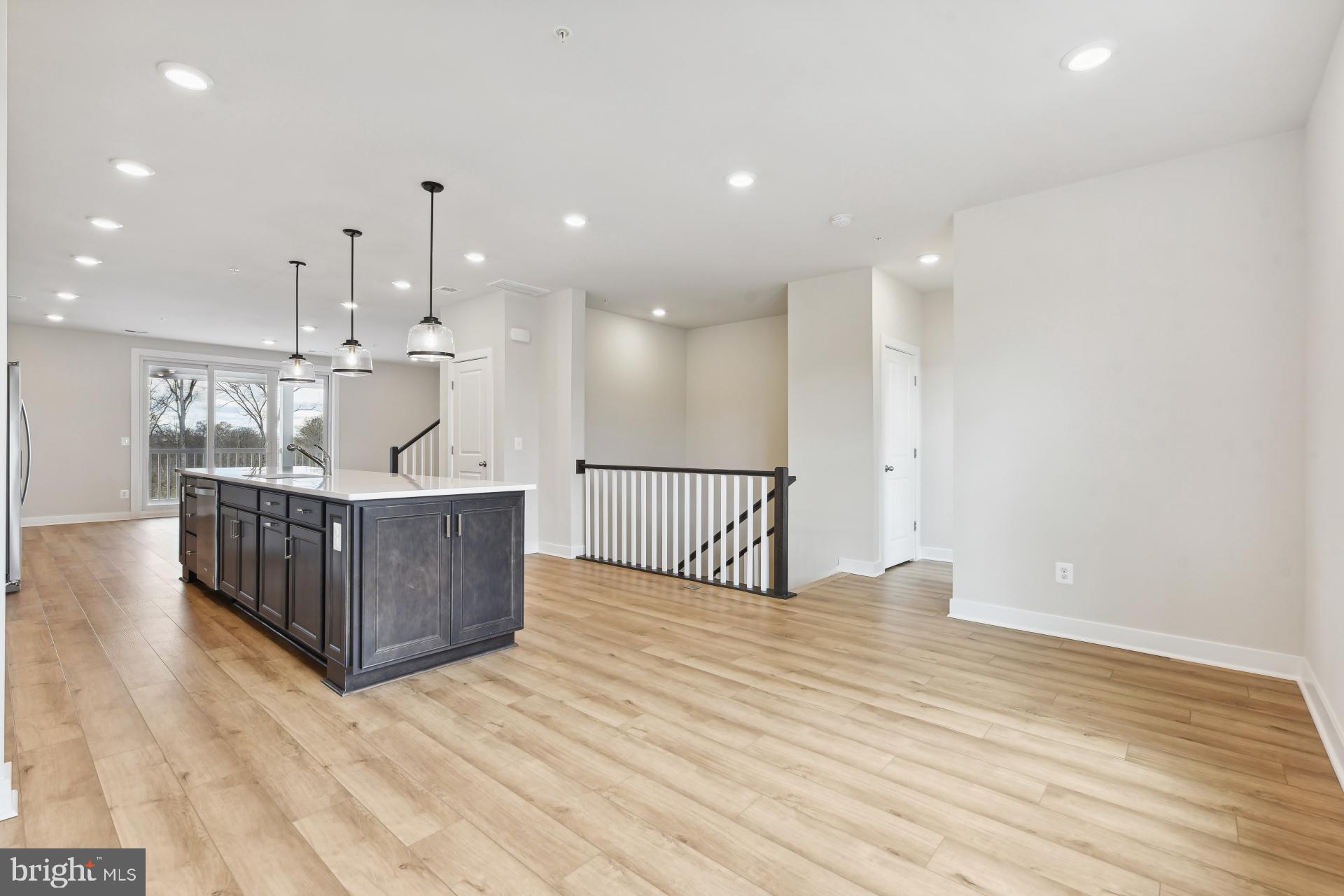 20783 Rumbullion Drive Sterling, VA 20166 - Photo 3 of 20 a view of kitchen with wooden floor