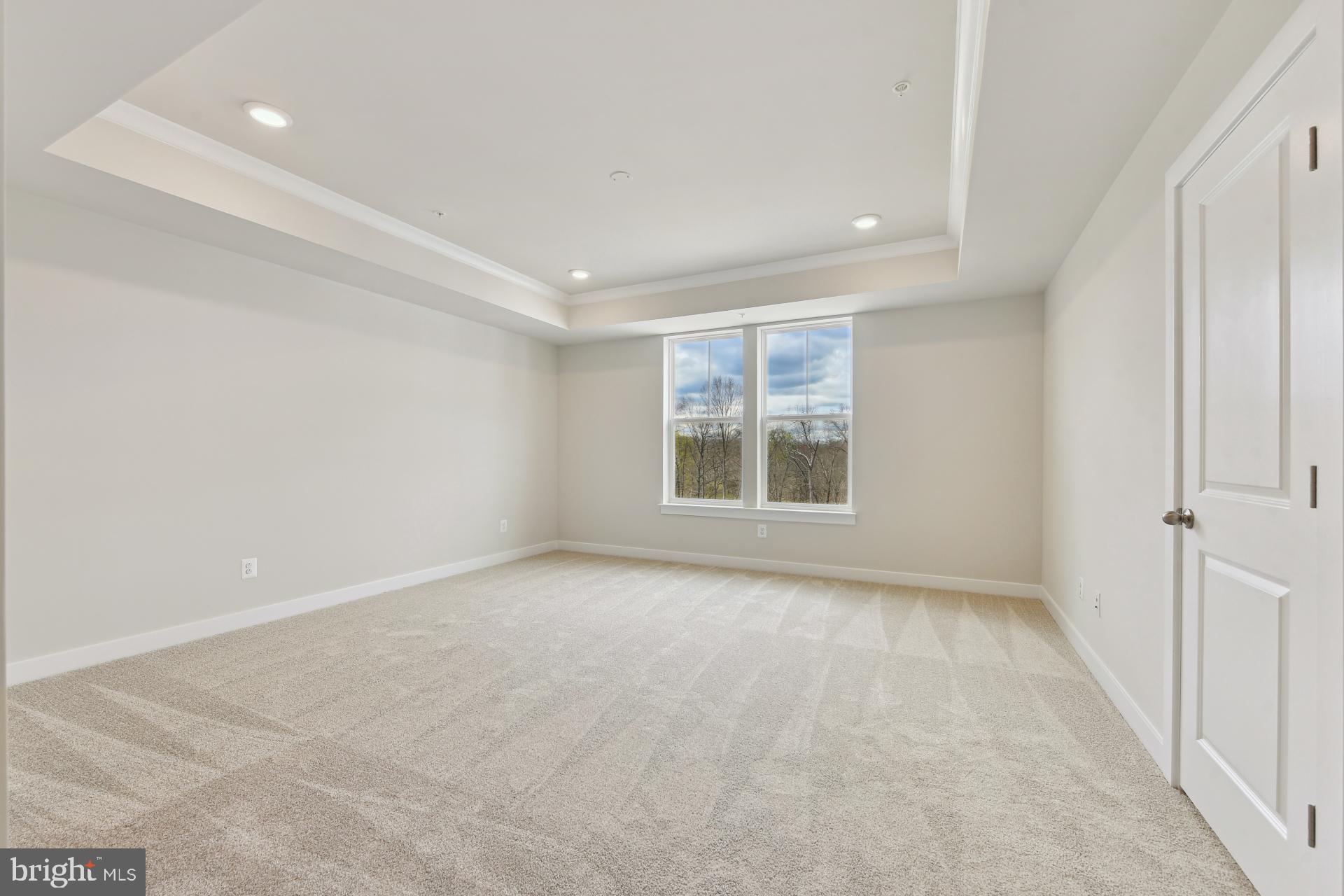 20783 Rumbullion Drive Sterling, VA 20166 - Photo 10 of 20 an empty room with windows