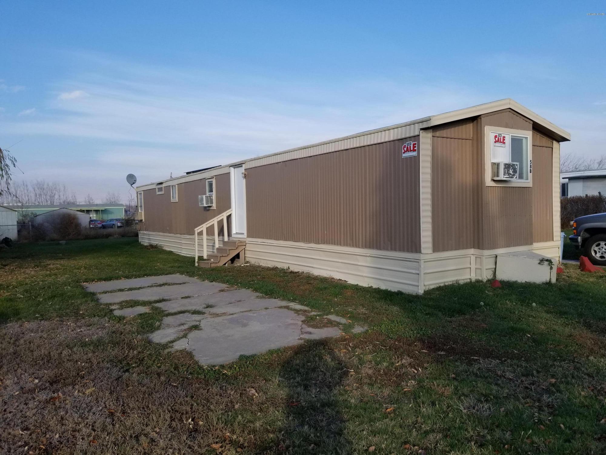 2802 Beaudry Road, Unit 58B Yakima, WA 98901 - Photo 11 of 11 a backyard of a house