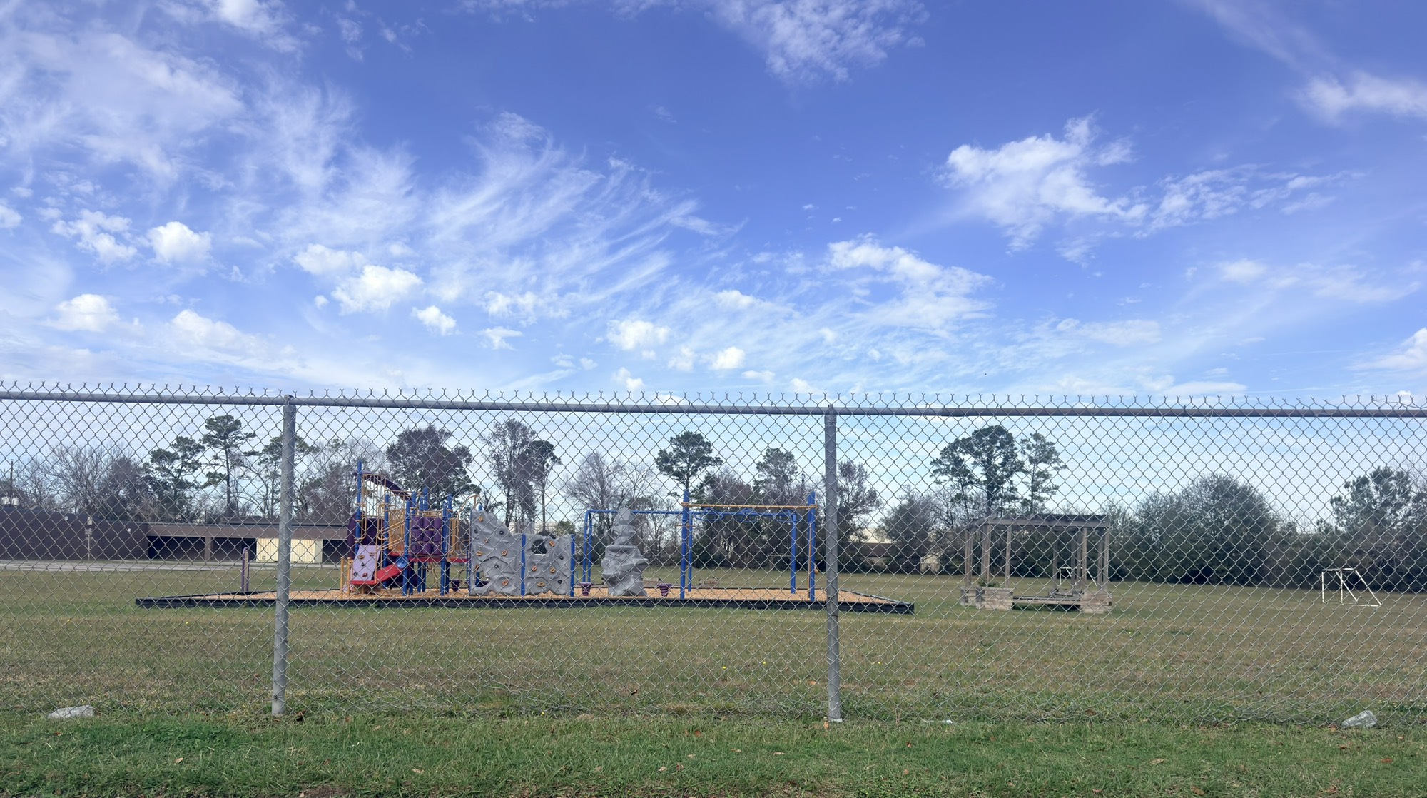 15537 Weldon Drive Houston, TX 77032 - Photo 2 of 4 a view of a golf course with a lake