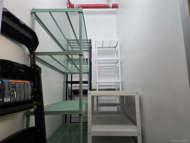 a view of entryway and kitchen