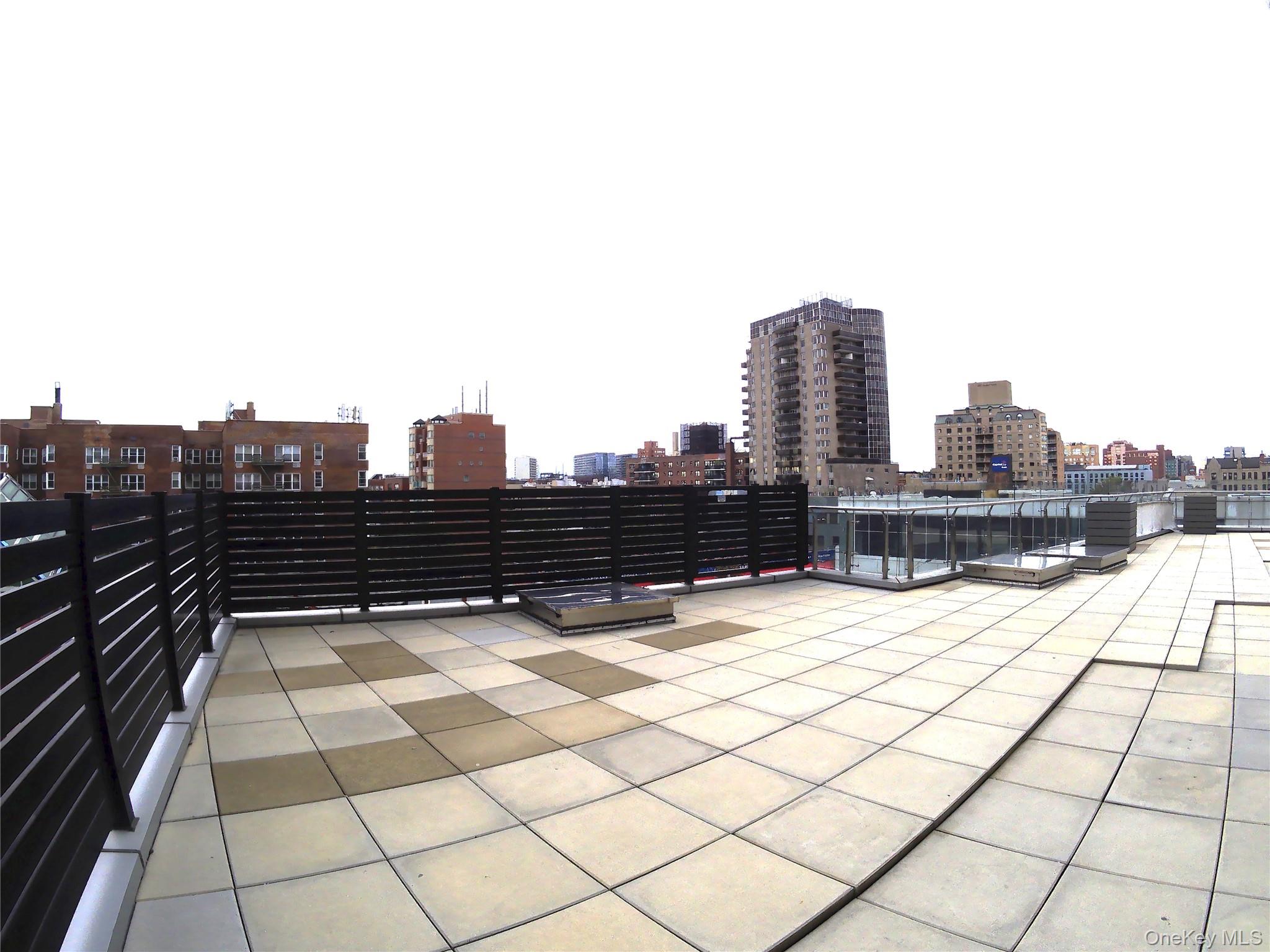 136-18 Maple Avenue, Unit 5E Queens, NY 11355 - Photo 10 of 11 a view of terrace