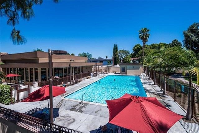 1711 Heather Avenue Tustin, CA 92780 - Photo 12 of 13 an outdoor space with furniture and a fire pit