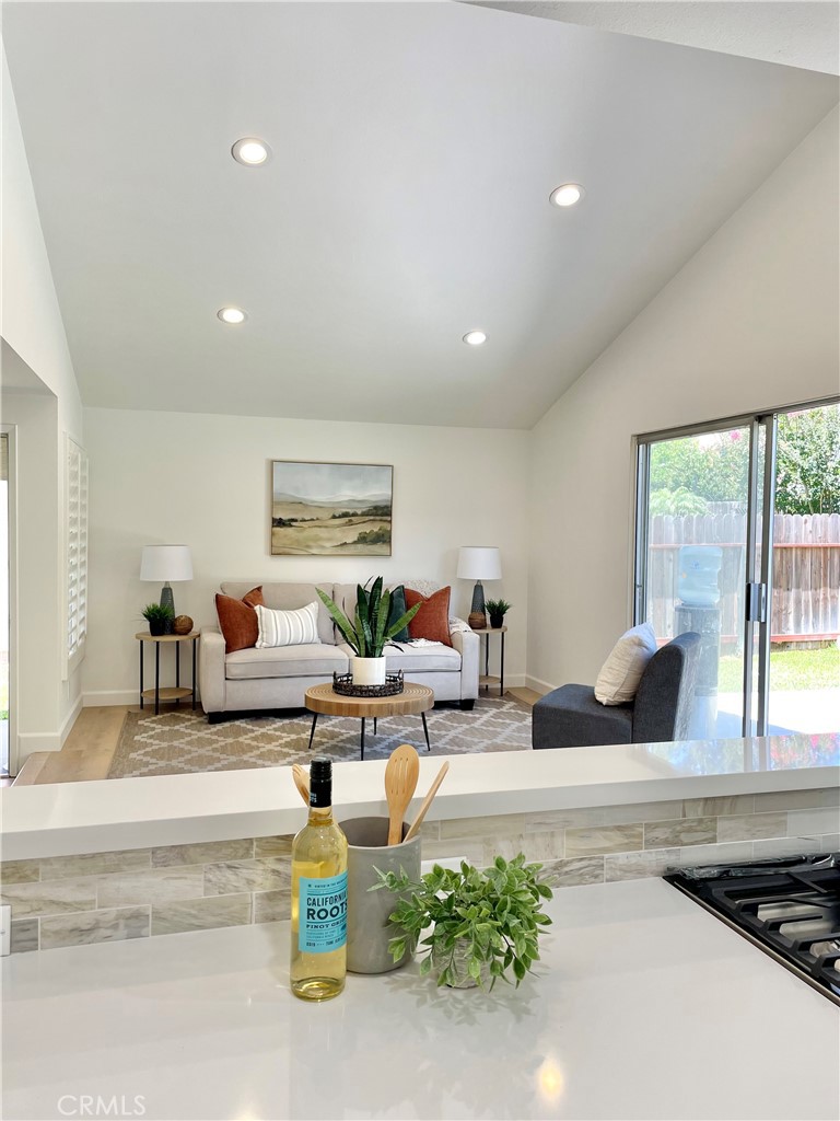 1711 Heather Avenue Tustin, CA 92780 - Photo 2 of 13 a living room with furniture and a large window