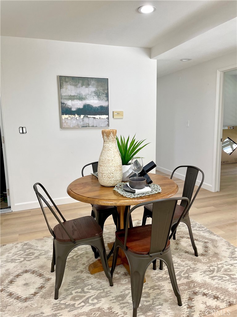 1711 Heather Avenue Tustin, CA 92780 - Photo 3 of 13 a view of a dining room with furniture