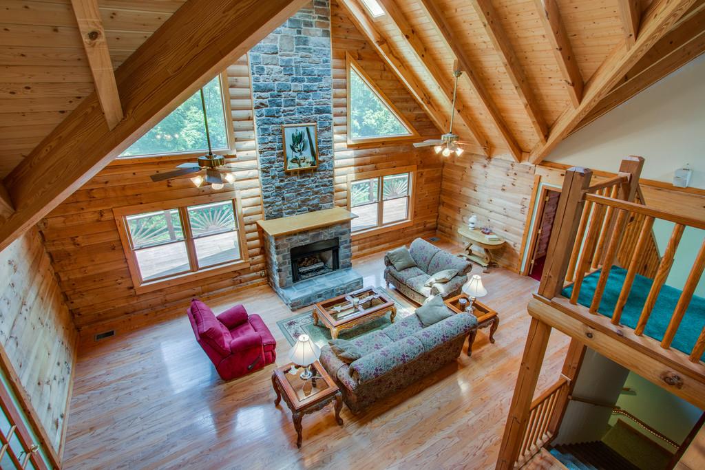 744 Keytown Road Portland, TN 37148 - Photo 17 of 30 a living room with furniture and a fireplace