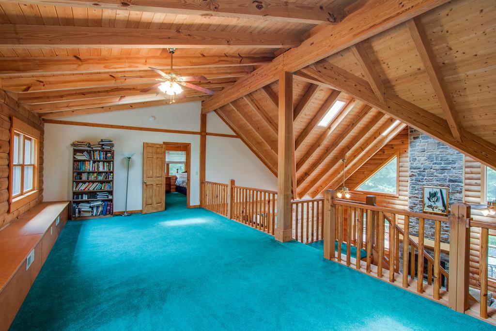 744 Keytown Road Portland, TN 37148 - Photo 18 of 30 a view of an empty room with window and stairs