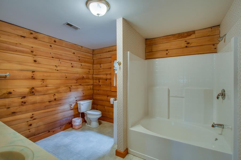 744 Keytown Road Portland, TN 37148 - Photo 20 of 30 a bathroom with a toilet and a shower