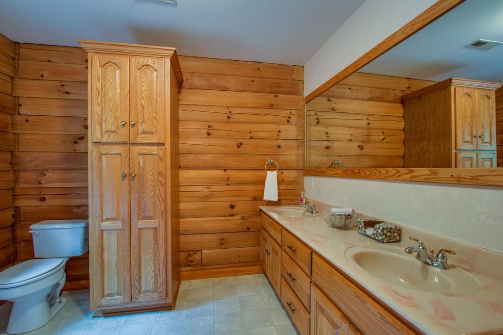 744 Keytown Road Portland, TN 37148 - Photo 23 of 30 a bathroom with a sink and a mirror