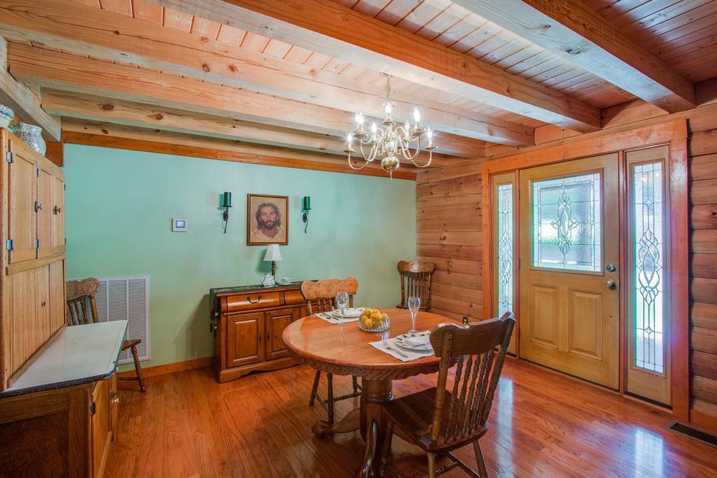 744 Keytown Road Portland, TN 37148 - Photo 4 of 30 a view of a dining room with furniture window and wooden floor