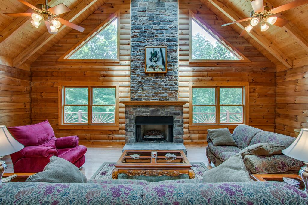 744 Keytown Road Portland, TN 37148 - Photo 7 of 30 a living room with furniture fireplace and window