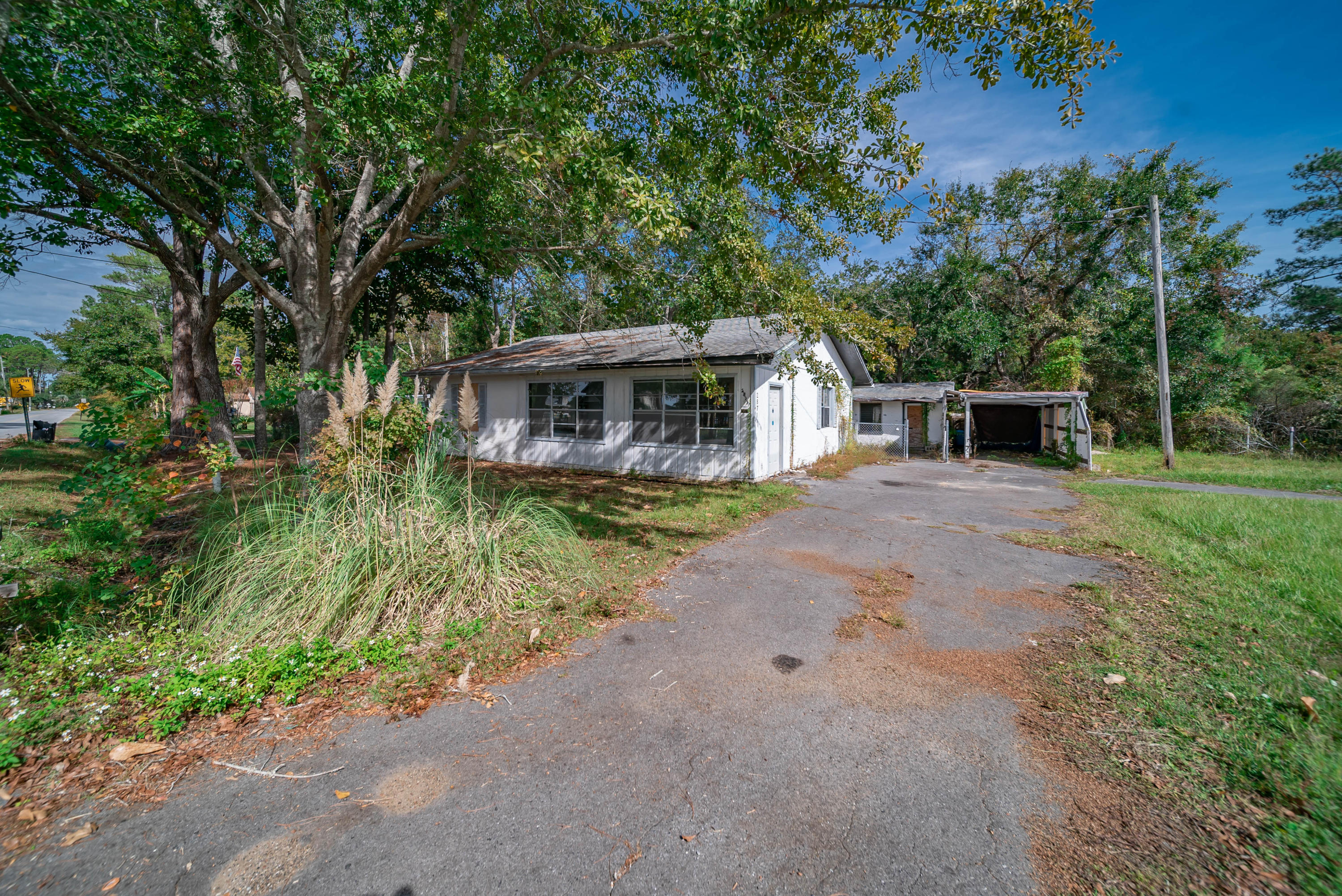 2871 Bay Grove Road Freeport, FL 32439 - Photo 15 of 17 a view of house with outdoor space and swimming pool