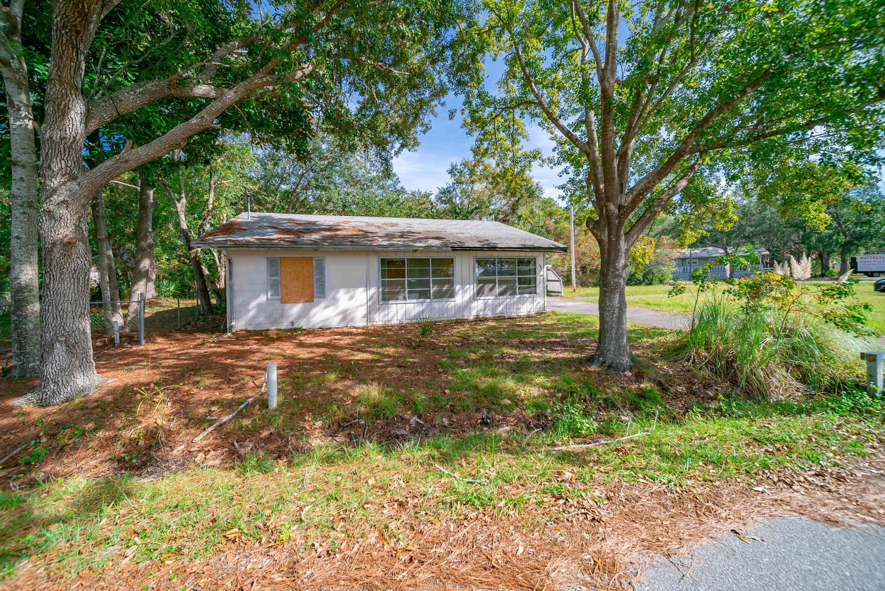 2871 Bay Grove Road Freeport, FL 32439 - Photo 16 of 17 a view of a house with a yard