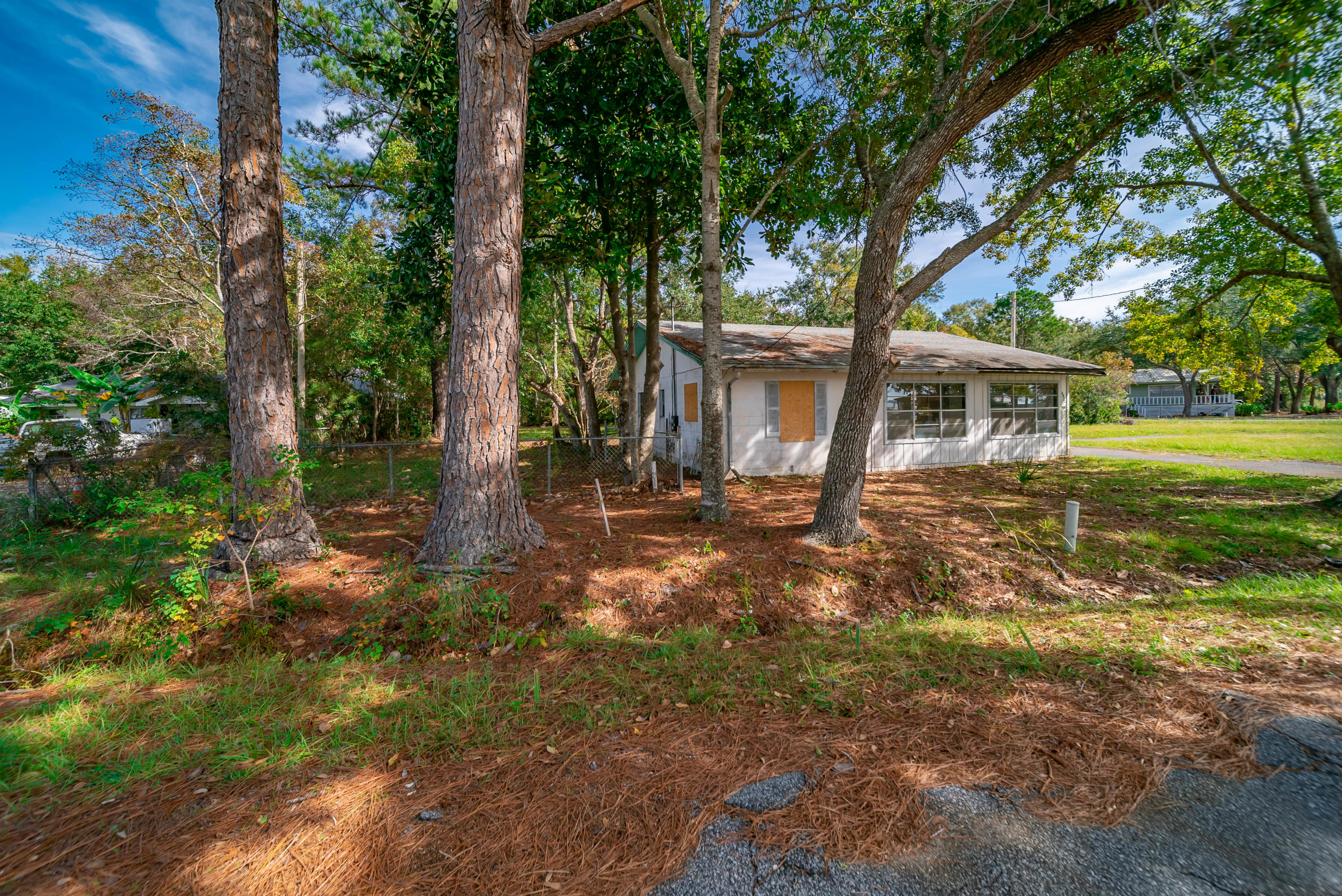 2871 Bay Grove Road Freeport, FL 32439 - Photo 17 of 17 a view of a house with a yard