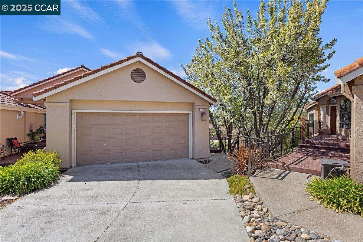 3075 Tahoe Place San Ramon, CA 94582 - Photo 1 of 1 a front view of a house with a yard and garage