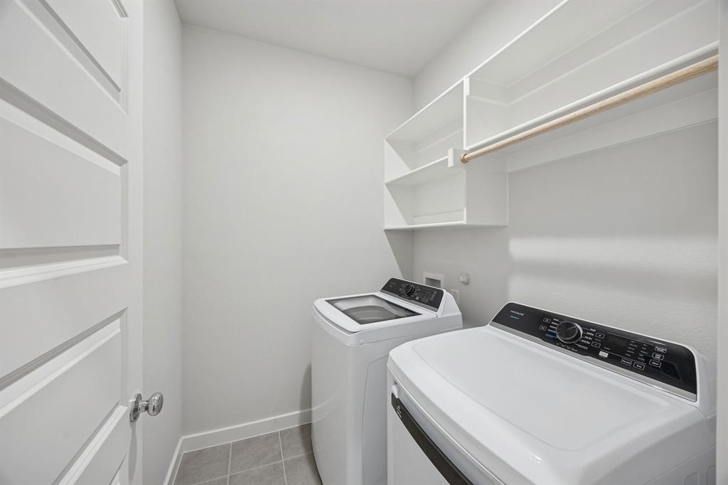 316 Millwood Road Lavon, TX 75166 - Photo 15 of 37 Utility room in the Oak II home plan by Trophy Signature Homes – REPRESENTATIVE PHOTO