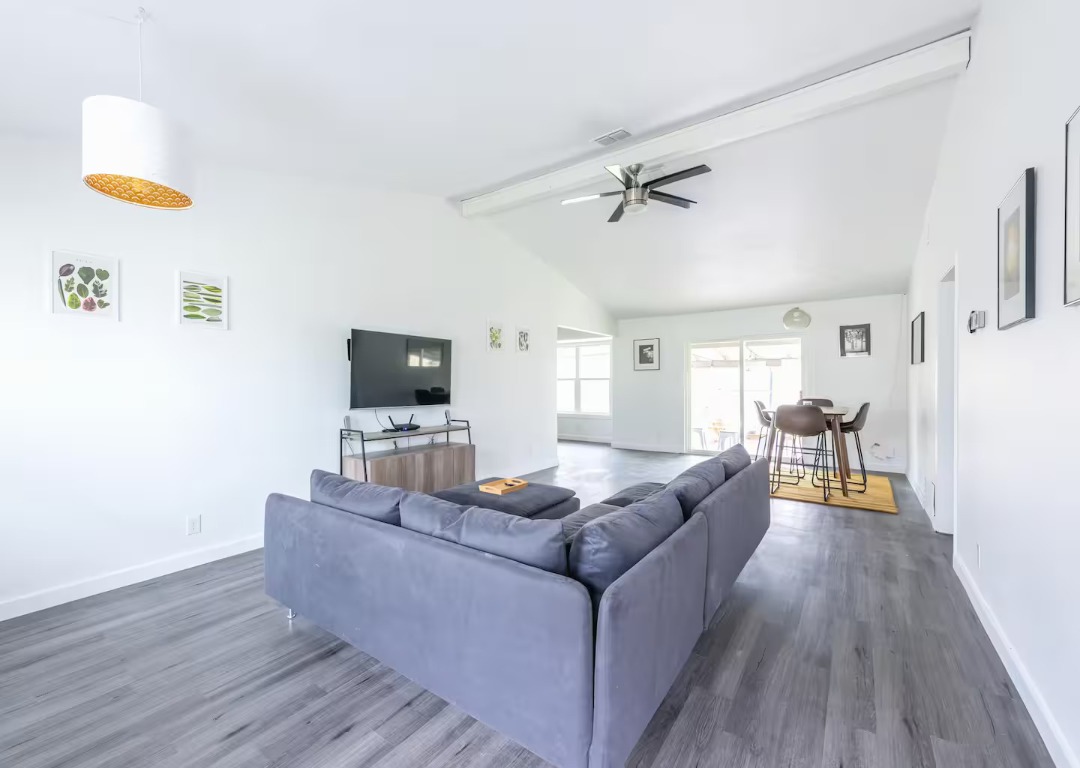 9715 Dallum Drive Austin, TX 78753 - Photo 2 of 21 a living room with furniture and a flat screen tv