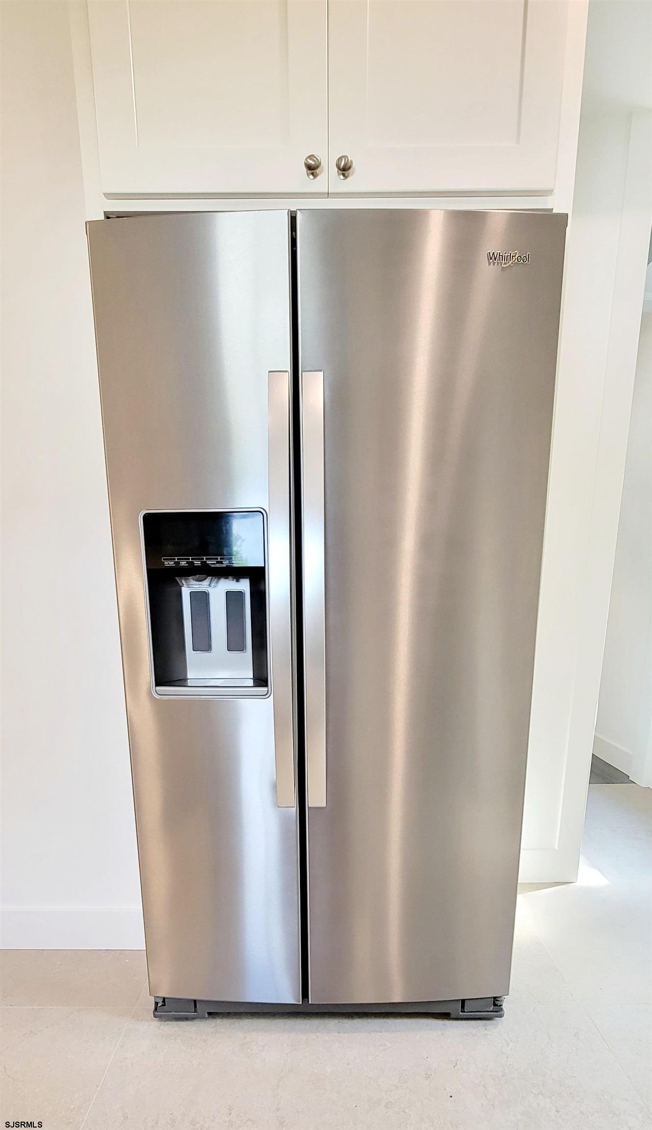 6594 Mill Road Egg Harbor Township, NJ 08234 - Photo 14 of 72 a view of a refrigerator in kitchen