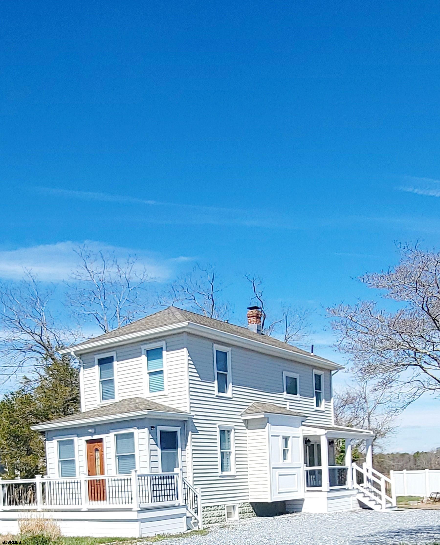 6594 Mill Road Egg Harbor Township, NJ 08234 - Photo 3 of 72 a front view of a building with a yard