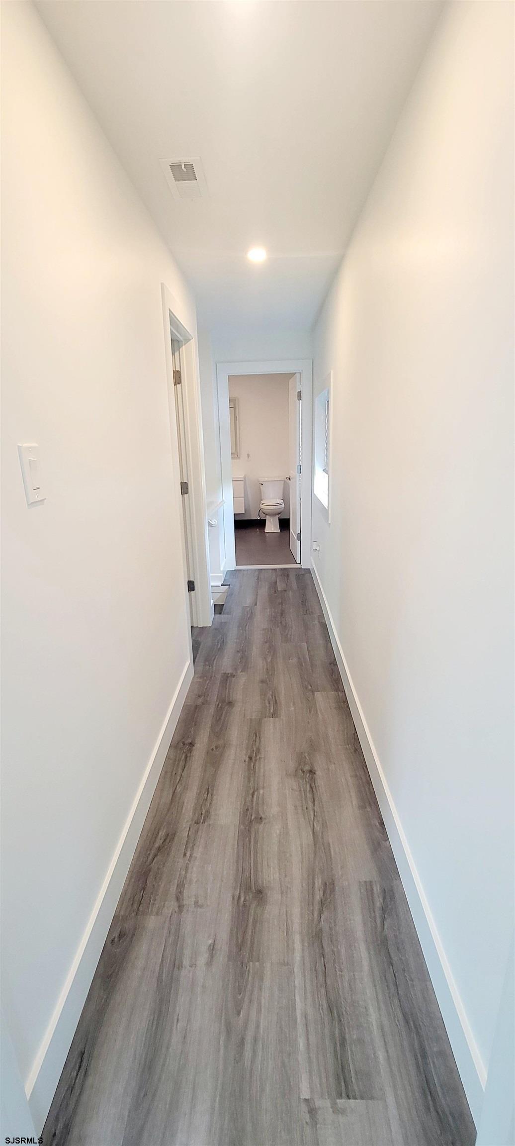6594 Mill Road Egg Harbor Township, NJ 08234 - Photo 39 of 72 a view of a room with wooden floor and window