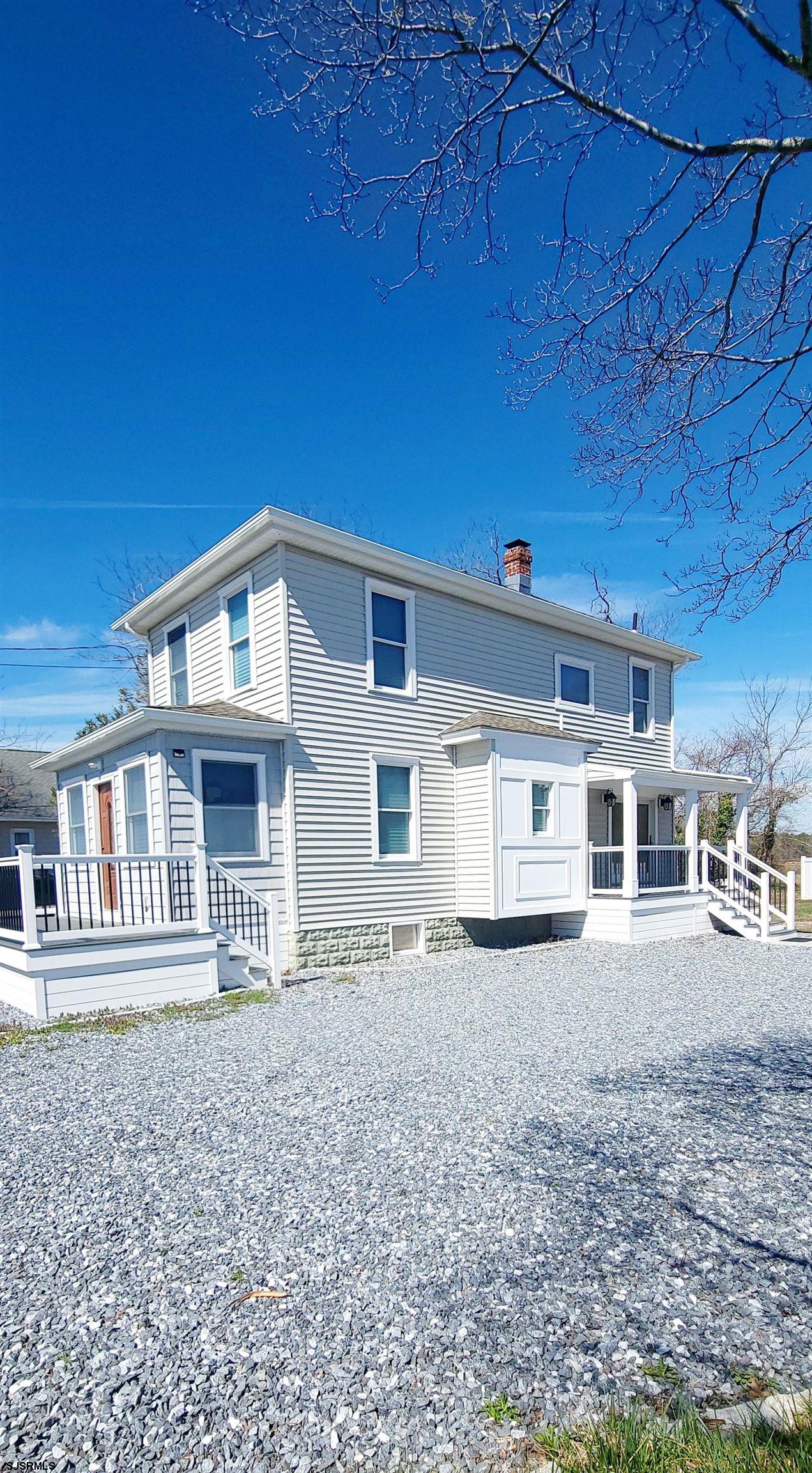 6594 Mill Road Egg Harbor Township, NJ 08234 - Photo 4 of 72 front view of a house with a street