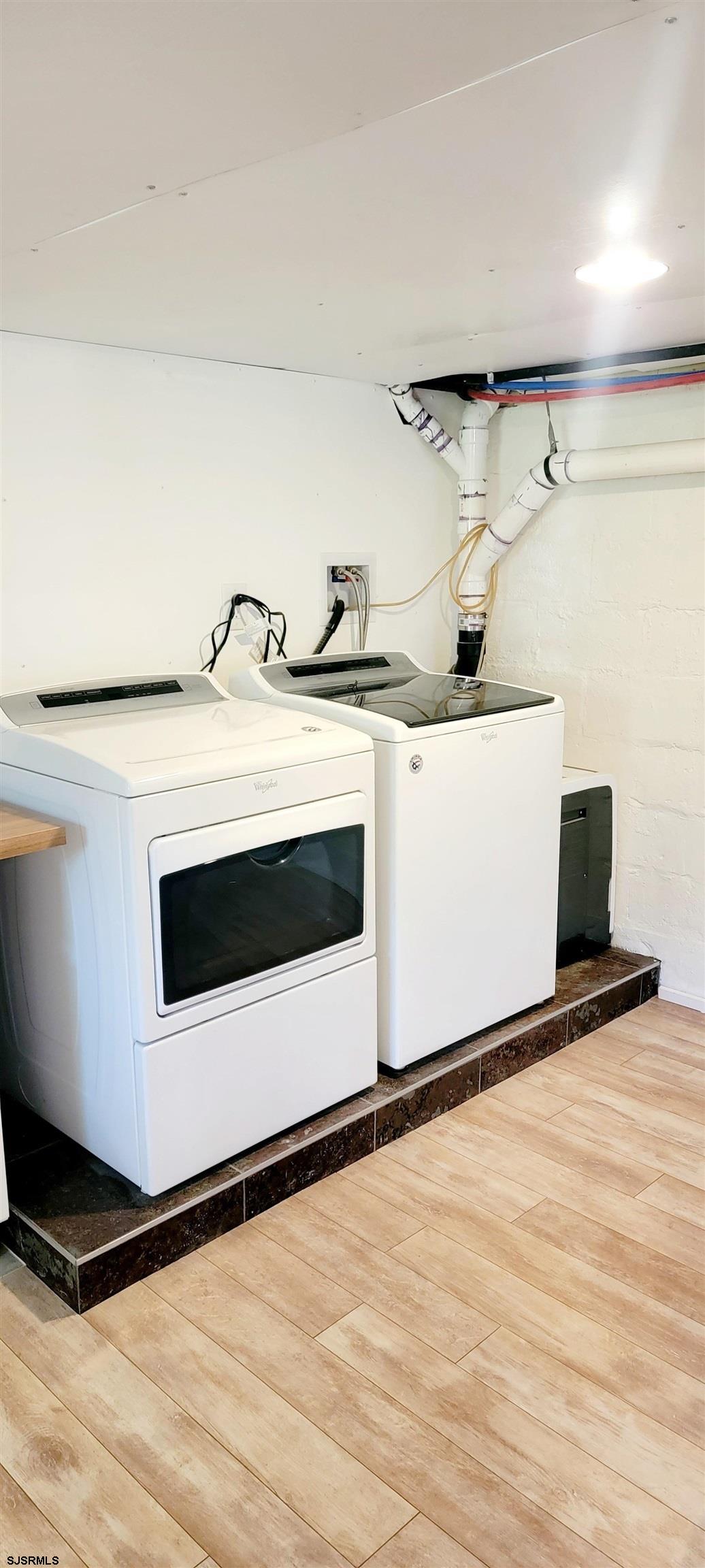 6594 Mill Road Egg Harbor Township, NJ 08234 - Photo 54 of 72 a utility room with dryer and washer