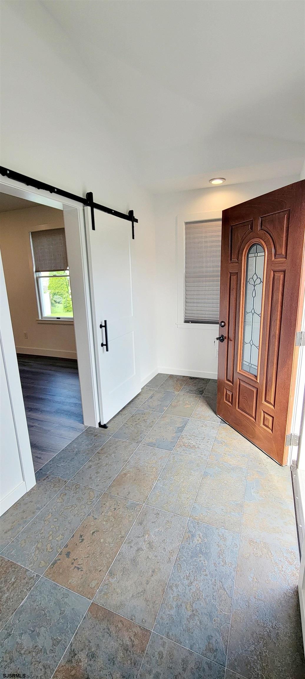6594 Mill Road Egg Harbor Township, NJ 08234 - Photo 63 of 72 an empty room with windows