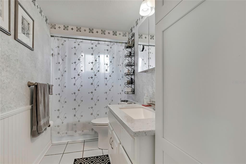 6601 Sea Ranch Drive Hudson, FL 34667 - Photo 14 of 43 a bathroom with a sink toilet and shower