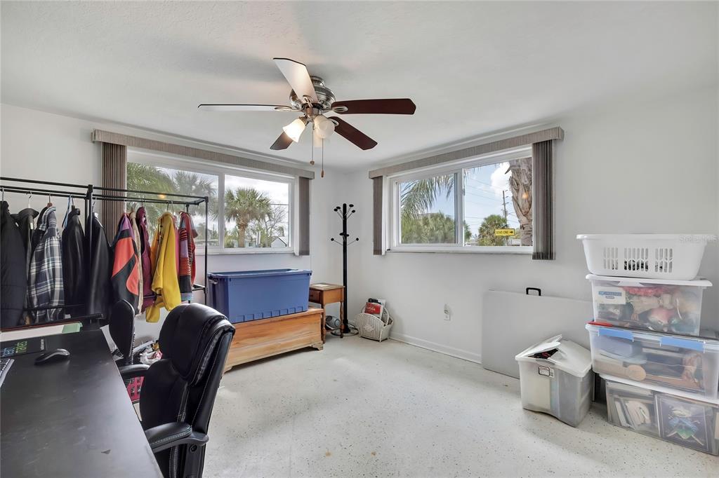 6601 Sea Ranch Drive Hudson, FL 34667 - Photo 15 of 43 a bedroom with furniture and a window