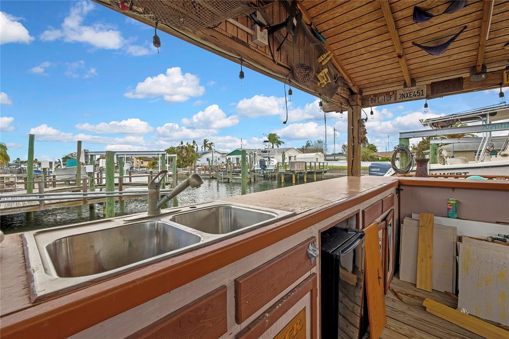 6601 Sea Ranch Drive Hudson, FL 34667 - Photo 23 of 43 a view of a city from a balcony with furniture