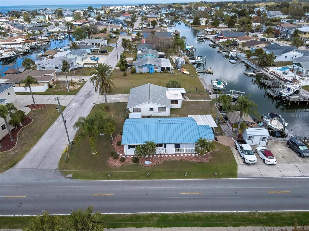 6601 Sea Ranch Drive Hudson, FL 34667 - Photo 35 of 43 an aerial view of a house with garden space and ocean view