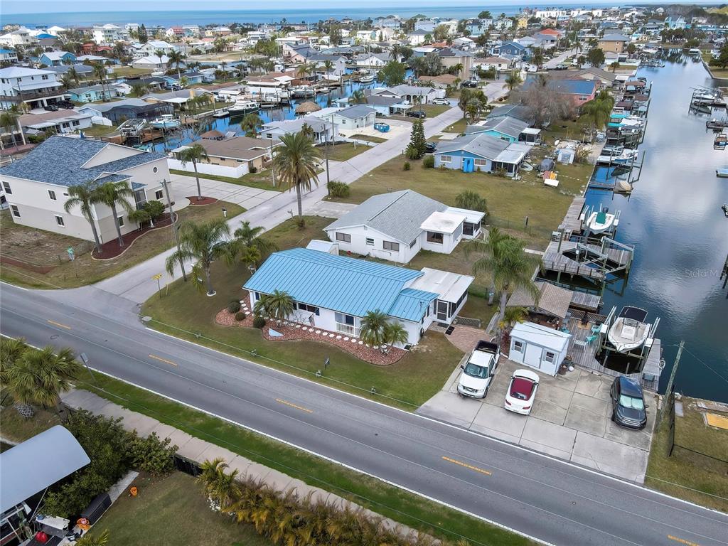 6601 Sea Ranch Drive Hudson, FL 34667 - Photo 36 of 43 an aerial view of a house with yard swimming pool and ocean view