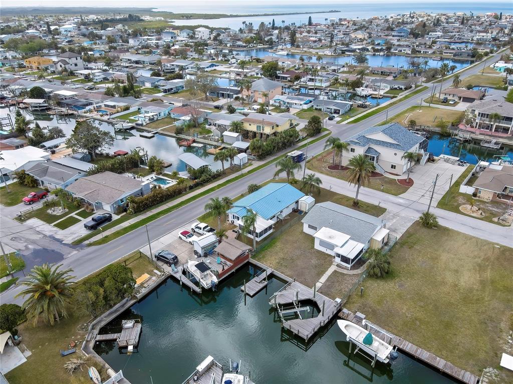 6601 Sea Ranch Drive Hudson, FL 34667 - Photo 39 of 43 an aerial view of residential houses with outdoor space