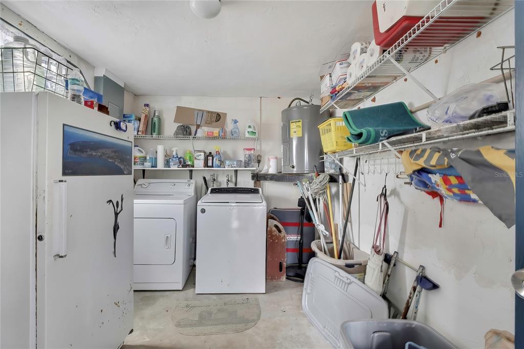 6601 Sea Ranch Drive Hudson, FL 34667 - Photo 42 of 43 a utility room with dryer and washer