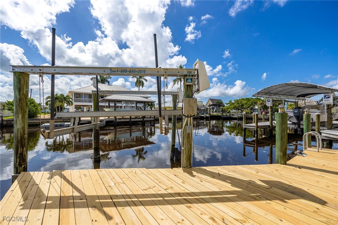 2761 Geary Street Matlacha, FL 33993 - Photo 32 of 50 a view of a patio with a table and chairs