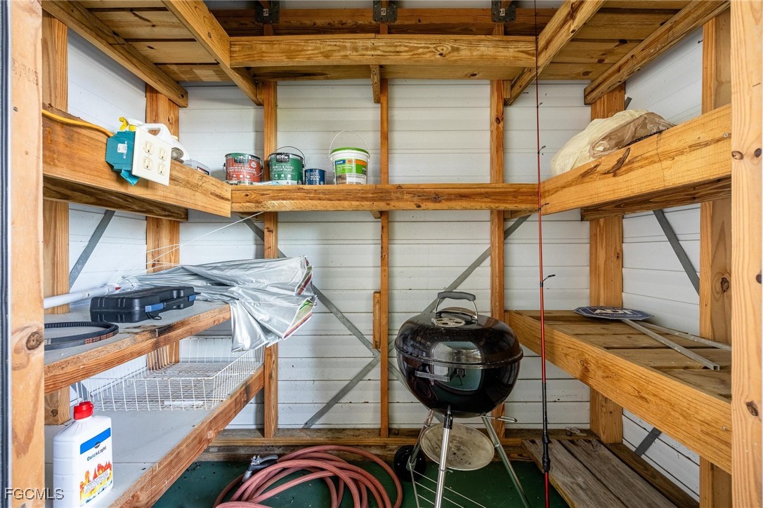 2761 Geary Street Matlacha, FL 33993 - Photo 36 of 50 a view of a two chairs in the roof