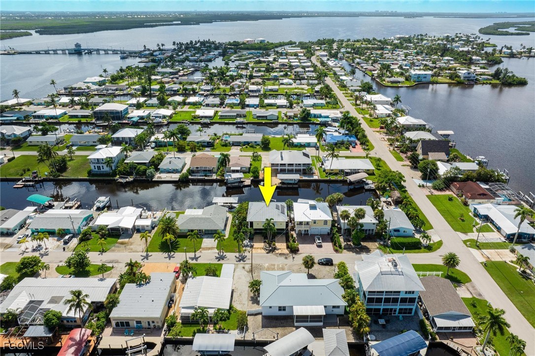 2761 Geary Street Matlacha, FL 33993 - Photo 43 of 50 a view of lots of residential buildings and lake