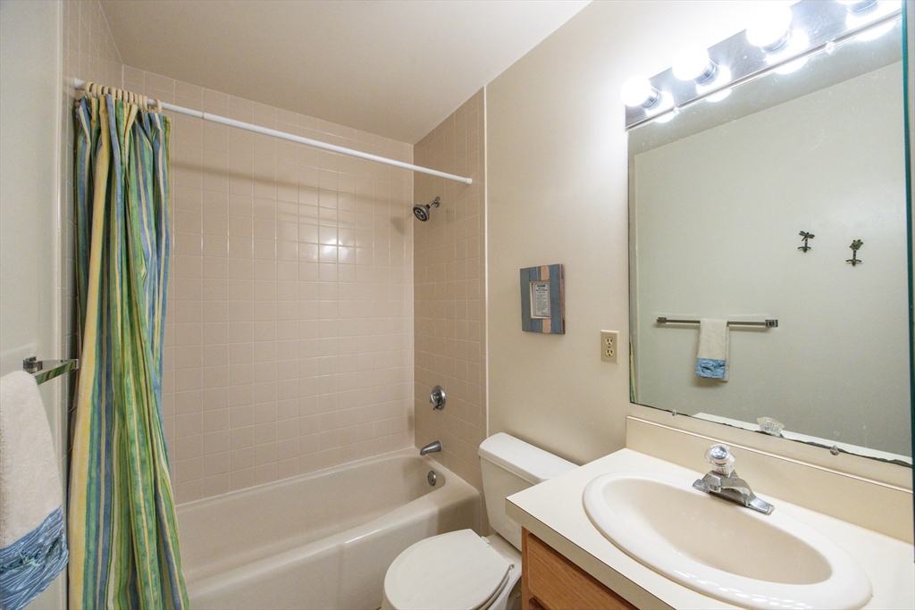 78 Eaton Lane, Unit 78 Brewster, MA 02631 - Photo 26 of 41 a bathroom with a sink toilet and shower