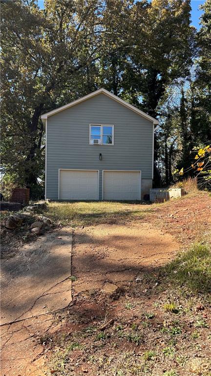 a house with trees in the background