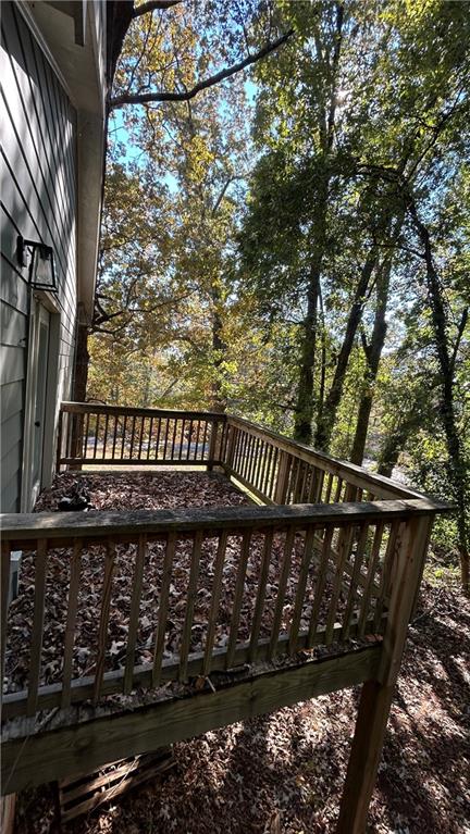4181 Danforth Road Southwest Atlanta, GA 30331 - Photo 18 of 18 a view of a wooden balcony with a bench