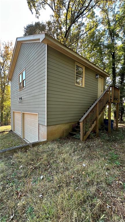 4181 Danforth Road Southwest Atlanta, GA 30331 - Photo 2 of 18 a view of a house with a yard