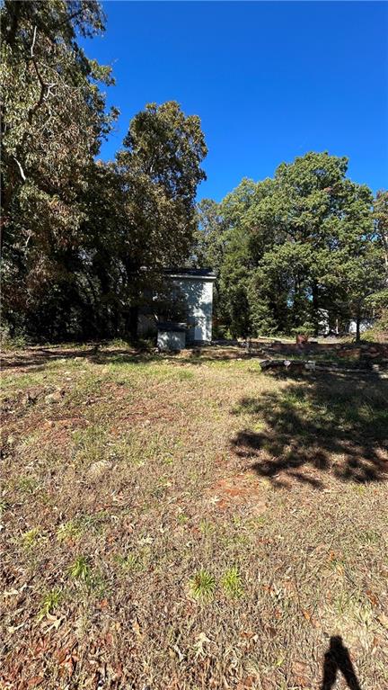 4181 Danforth Road Southwest Atlanta, GA 30331 - Photo 7 of 18 a view of a yard with a tree