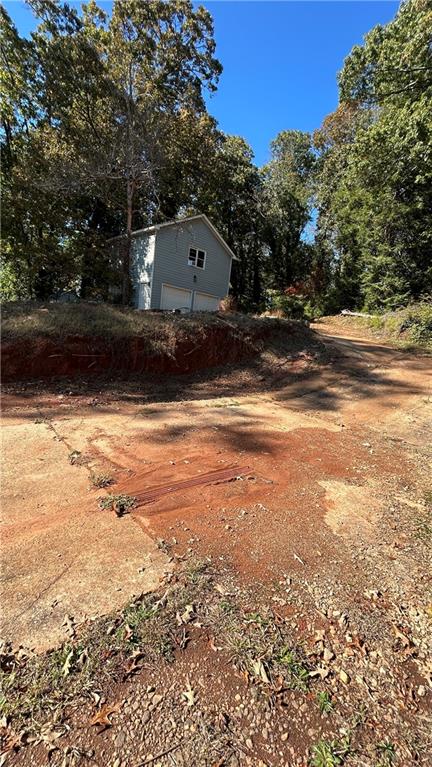 4181 Danforth Road Southwest Atlanta, GA 30331 - Photo 9 of 18 a view of yard with tree and a wooden fence