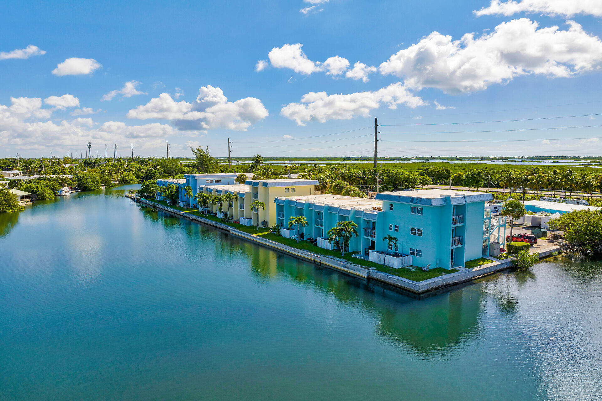 201 Coppitt Road, Unit 202C Key West, FL 33040 - Photo 25 of 31 an aerial view of residential houses with outdoor space and lake view