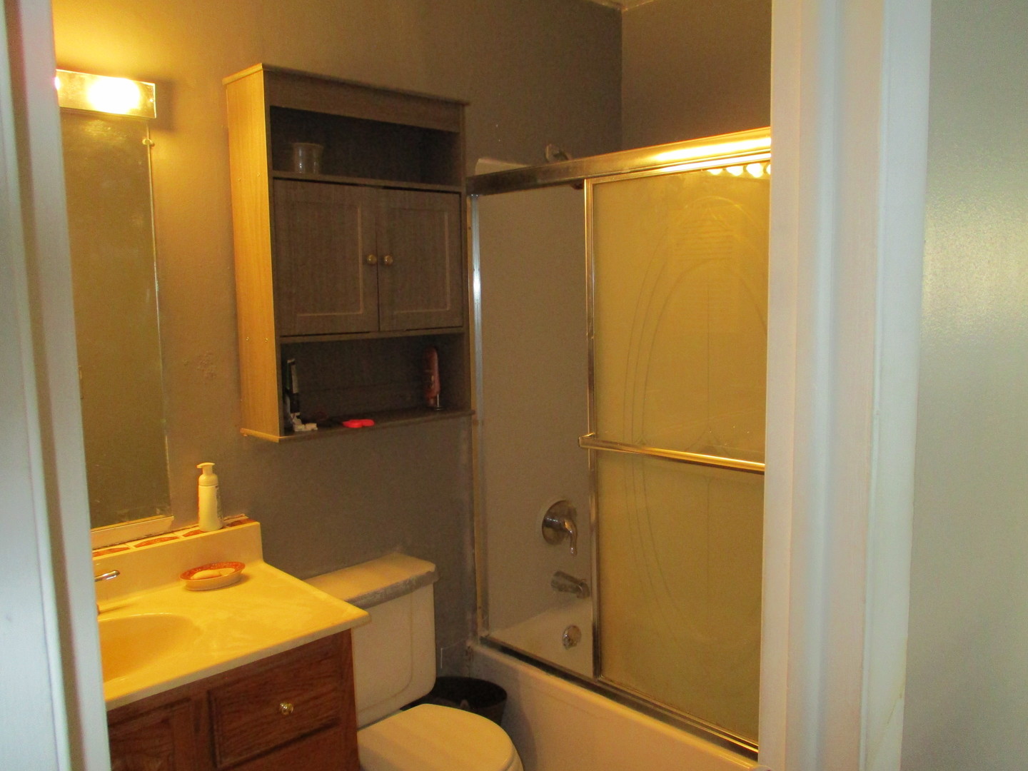 143 Ringneck Drive Glendale Heights, IL 60139 - Photo 9 of 17 a bathroom with a shower toilet and sink