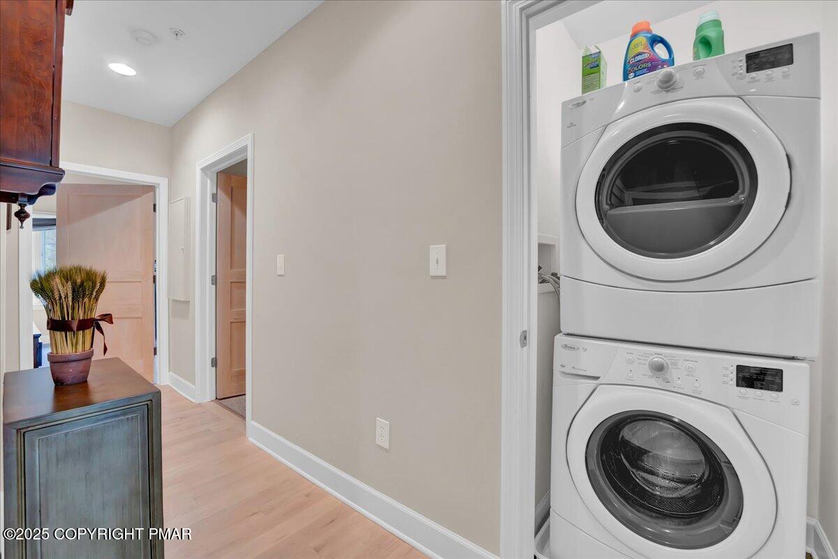 320 Hummingbird Way Lake, Unit 302J1 Lake Harmony, PA 18624 - Photo 13 of 29 a view of a hallway with washer and dryer