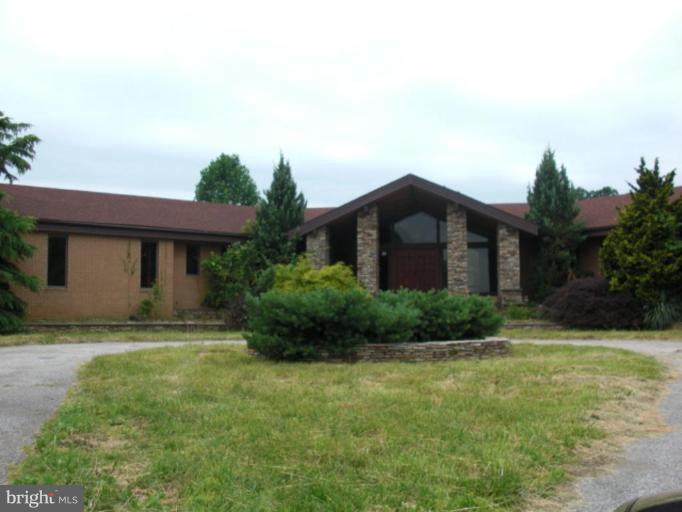 2224 Choate Road Fallston, MD 21047 - Photo 1 of 13 a front view of a house with garden