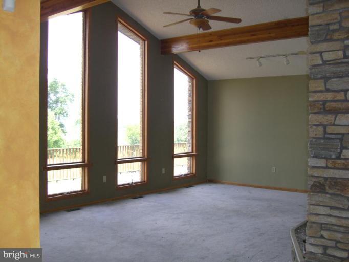 2224 Choate Road Fallston, MD 21047 - Photo 4 of 13 a view of an empty room with a window