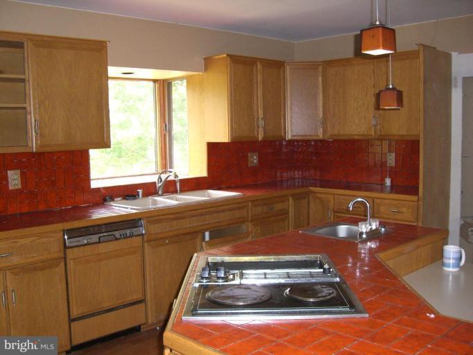 2224 Choate Road Fallston, MD 21047 - Photo 5 of 13 a kitchen with a sink a stove and a window