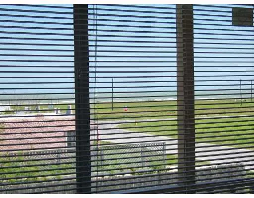 a view of a room with a large windows